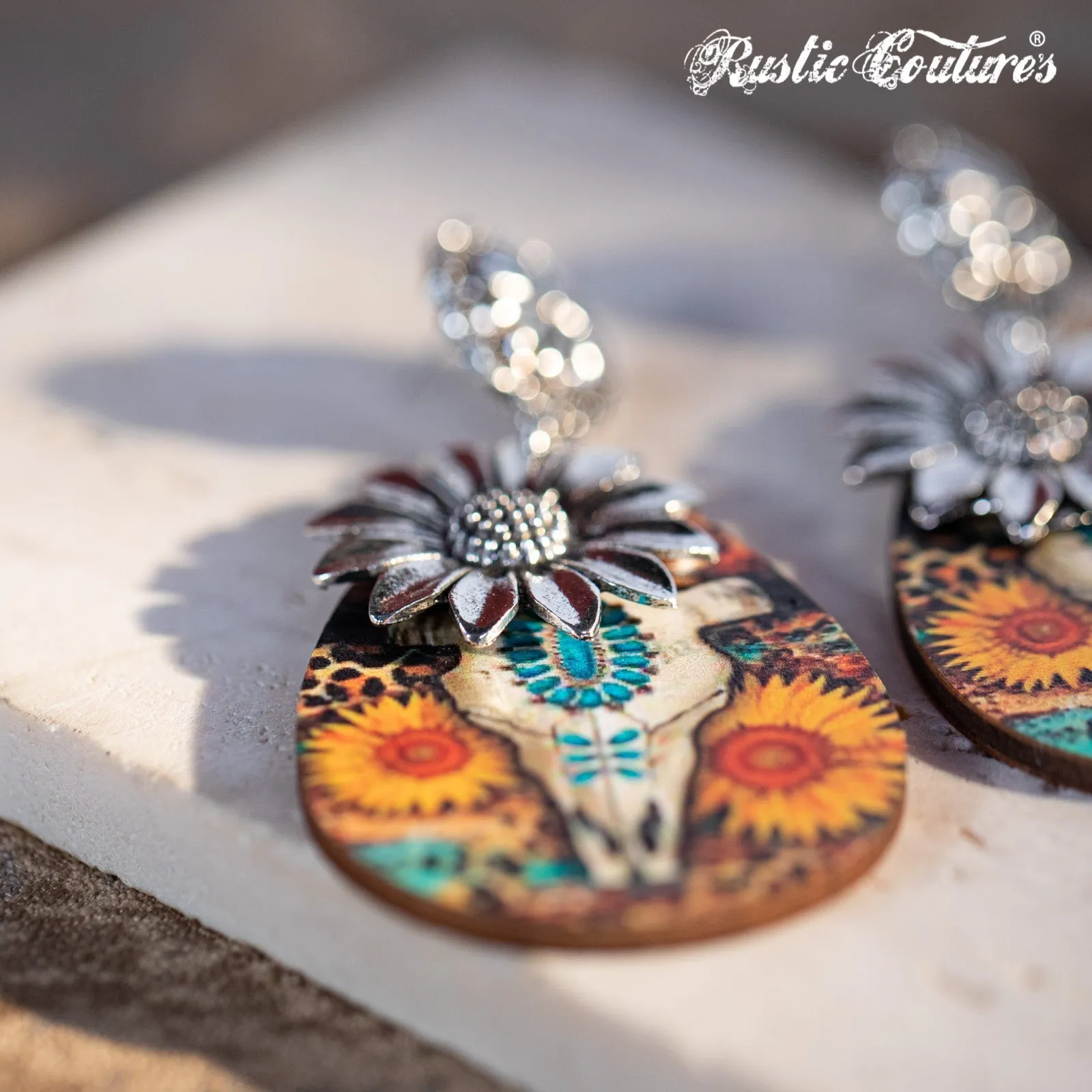 Rustic Couture's Metal Sunflower Wood Painted Bull Skull Dangling Earring